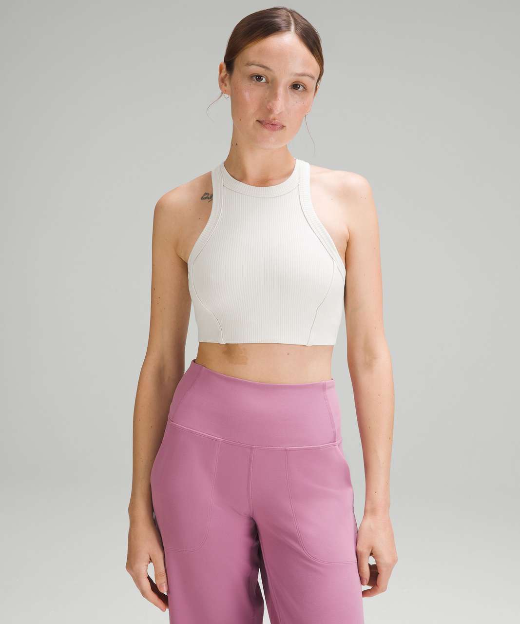 https://storage.googleapis.com/lulu-fanatics/product/82518/1280/lululemon-ribbed-nulu-high-neck-yoga-bra-light-support-b-c-cup-bone-027597-438312.jpg