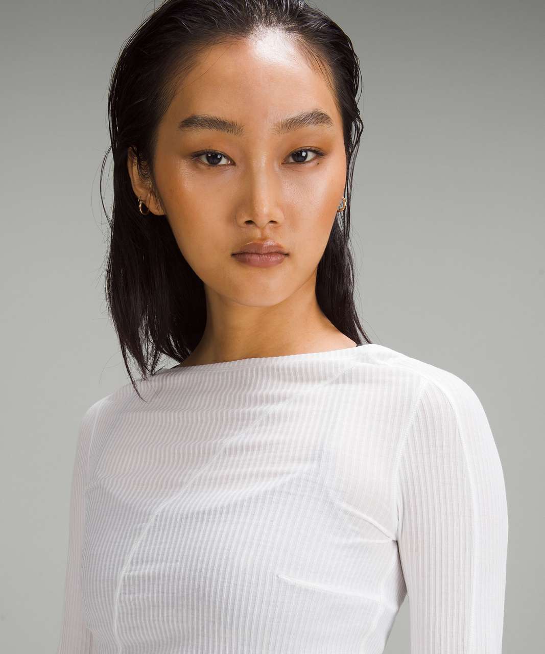 https://storage.googleapis.com/lulu-fanatics/product/82613/1280/lululemon-asymmetrical-ribbed-cotton-long-sleeve-shirt-white-0002-438829.jpg