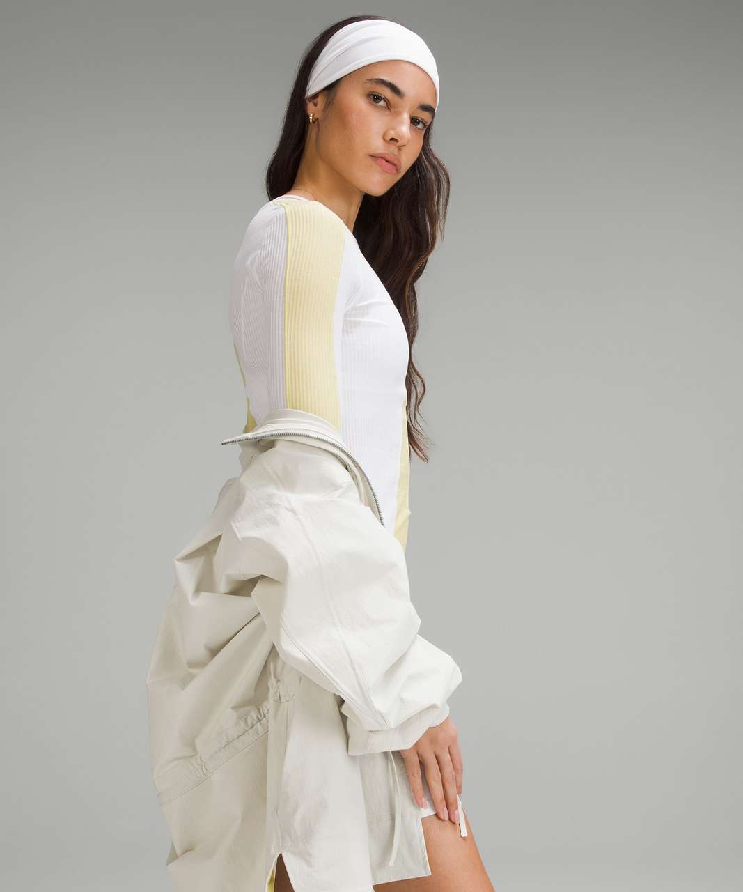 https://storage.googleapis.com/lulu-fanatics/product/82614/1280/lululemon-asymmetrical-ribbed-cotton-long-sleeve-shirt-finch-yellow-white-060458-438833.jpg