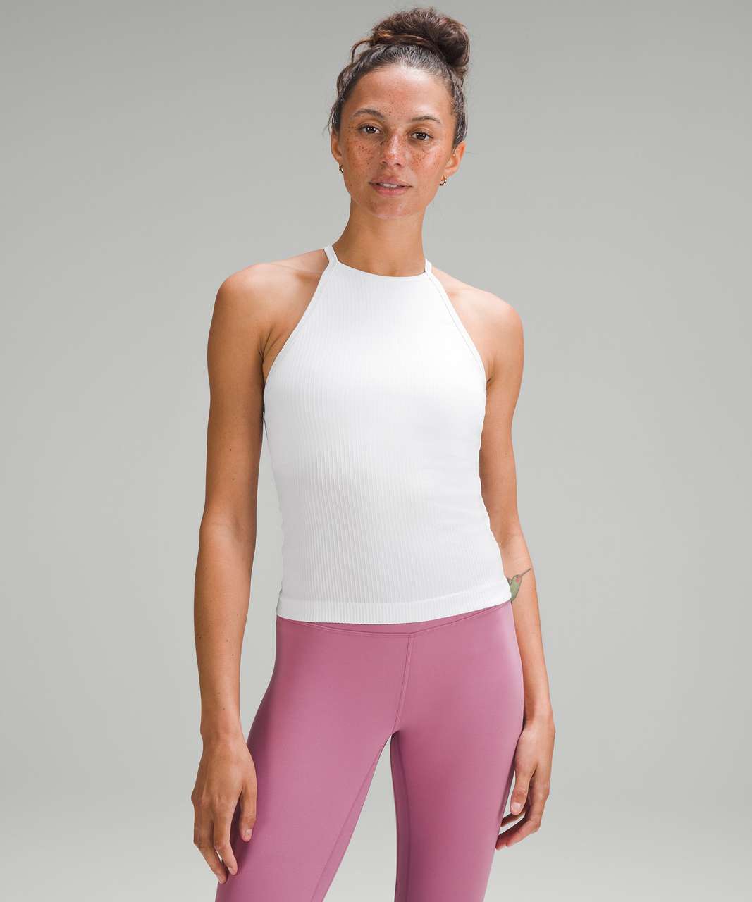 Hi, lulu babes! Does Lululemon have a high neck tank (or just not too low)  with built-in bra that would work okay for a 34DD? : r/lululemon
