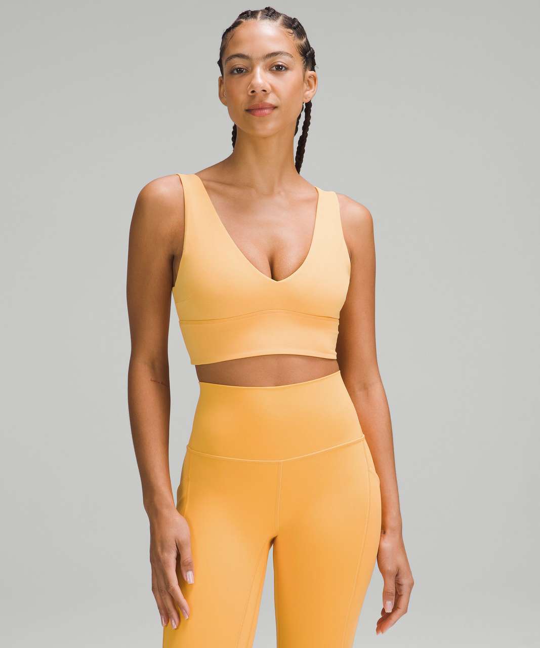 https://storage.googleapis.com/lulu-fanatics/product/84156/1280/lululemon-lululemon-align-v-neck-bra-light-support-c-d-cup-mango-dream-060715-446605.jpg