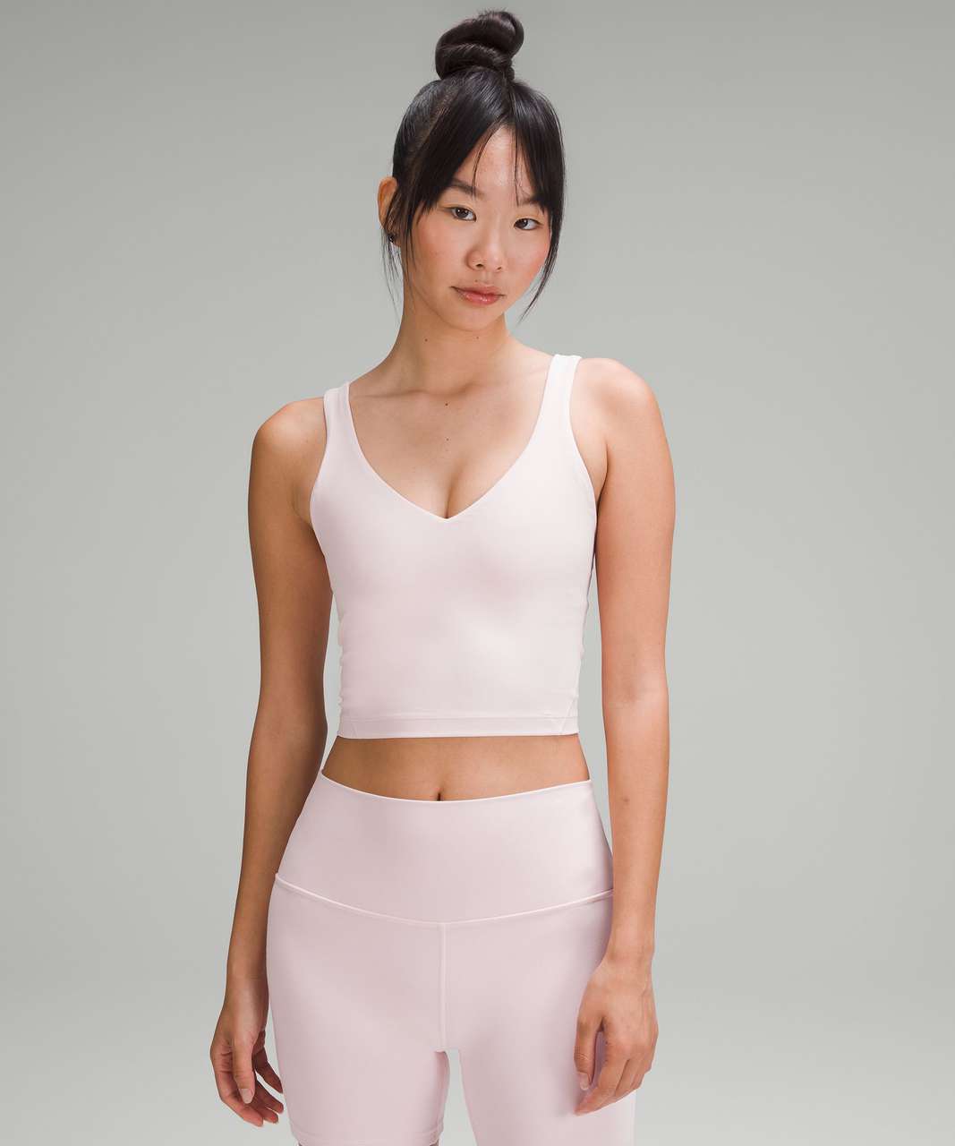 https://storage.googleapis.com/lulu-fanatics/product/84553/1280/lululemon-lululemon-align-tank-top-flush-pink-056852-448694.jpg