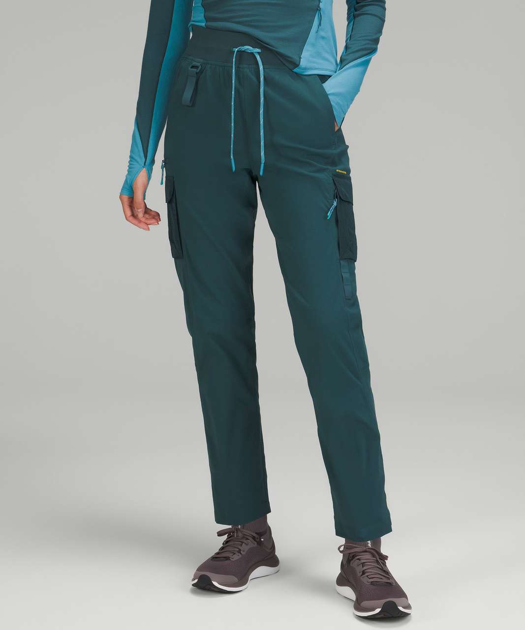 https://storage.googleapis.com/lulu-fanatics/product/84634/1280/lululemon-cargo-high-rise-lined-hiking-pant-green-jasper-034204-449114.jpg