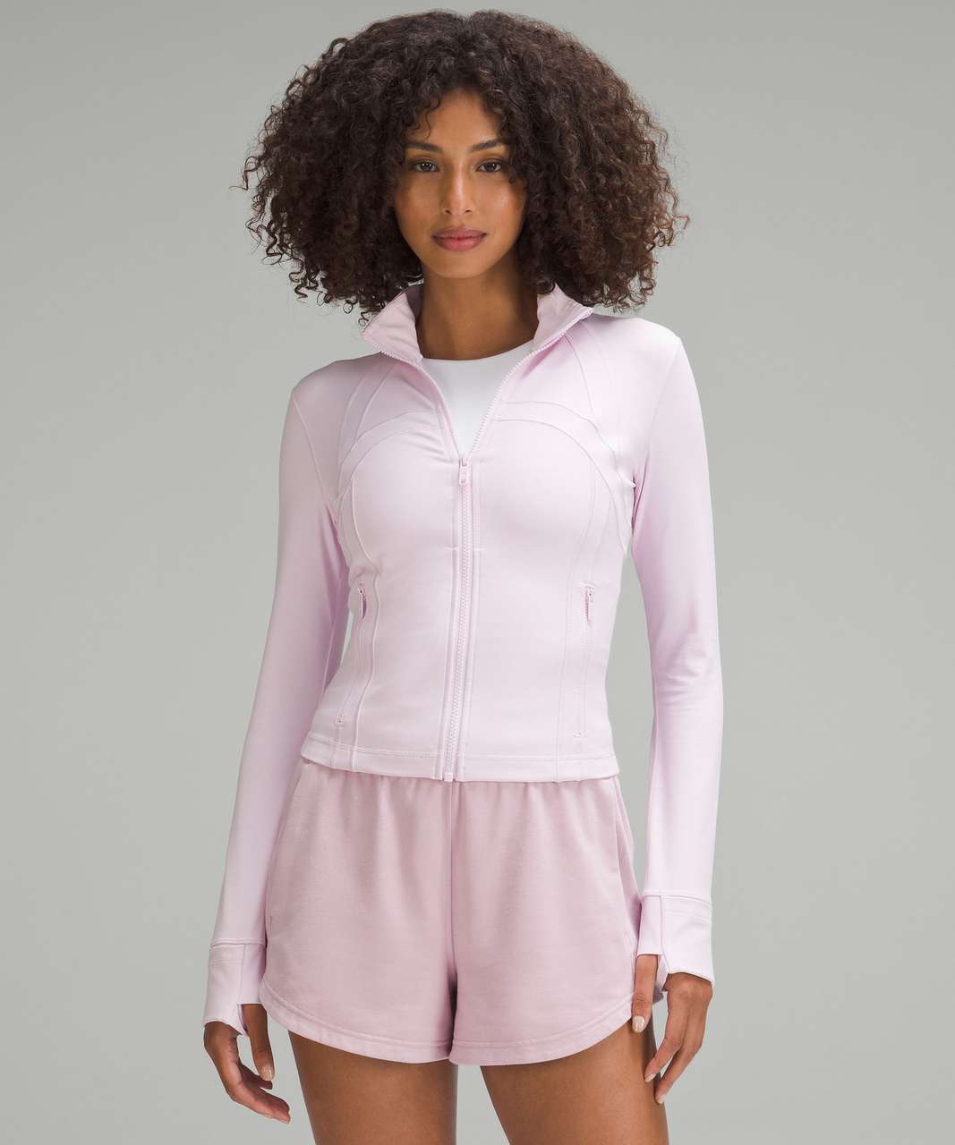 https://storage.googleapis.com/lulu-fanatics/product/85488/1280/lululemon-cropped-define-jacket-nulu-meadowsweet-pink-061860-453584.jpg