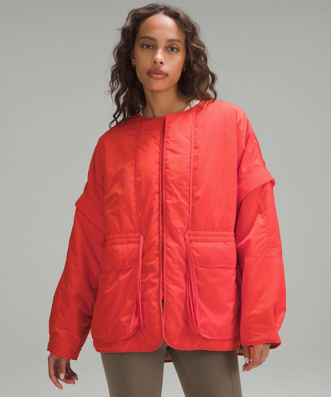 Orange Wunder Puffer Jacket by Lululemon for $100