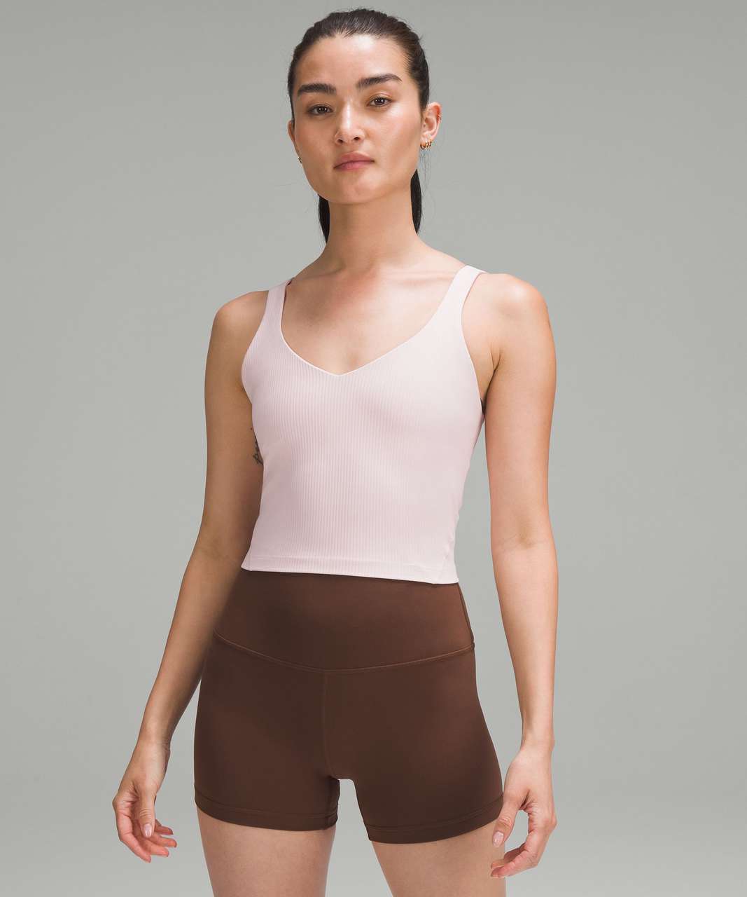 https://storage.googleapis.com/lulu-fanatics/product/85676/1280/lululemon-lululemon-align-ribbed-tank-top-flush-pink-056852-454559.jpg