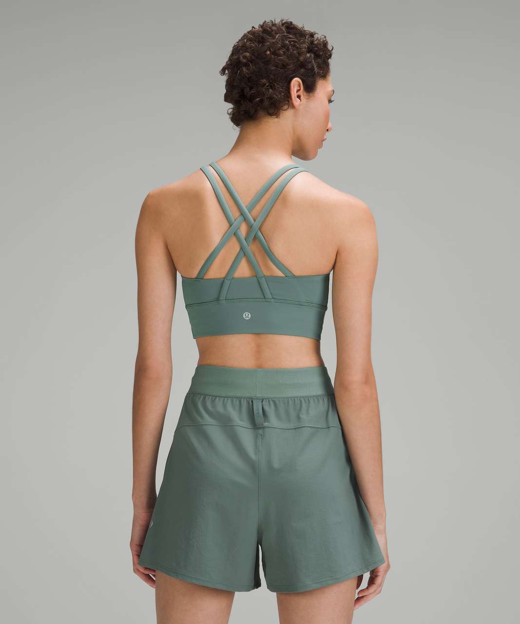 https://storage.googleapis.com/lulu-fanatics/product/85960/1280/lululemon-lululemon-energy-longline-bra-medium-support-b-d-cups-medium-forest-026839-456050.jpg