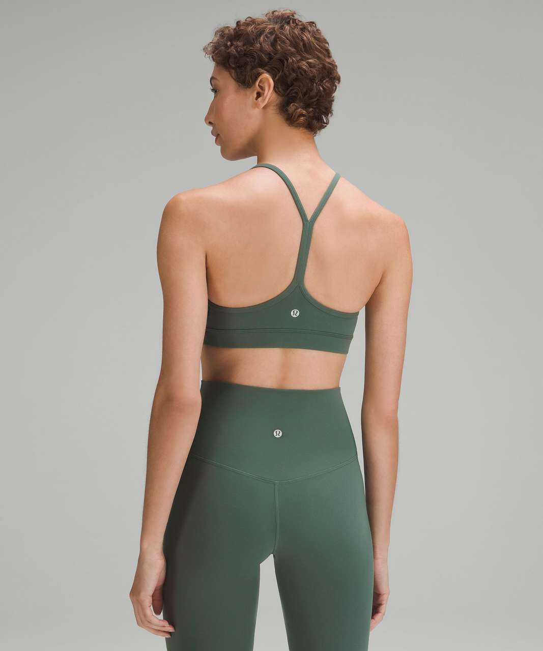 https://storage.googleapis.com/lulu-fanatics/product/86214/1280/lululemon-flow-y-bra-nulu-light-support-a-c-cups-dark-forest-029824-457490.jpg