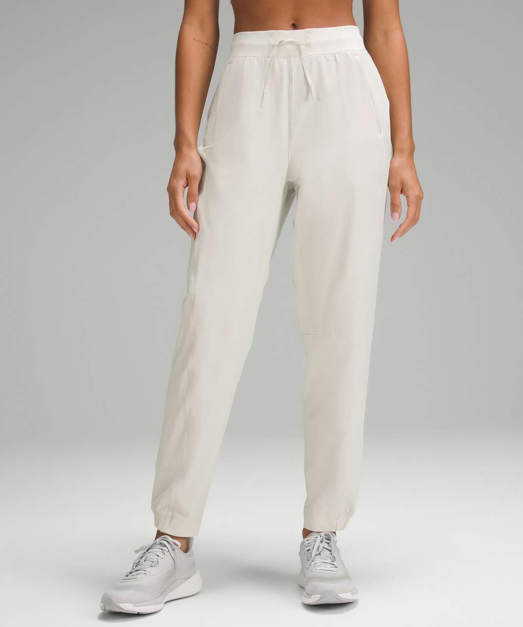 lululemon LICENSE TO TRAIN HIGH-RISE - Tracksuit bottoms - bone