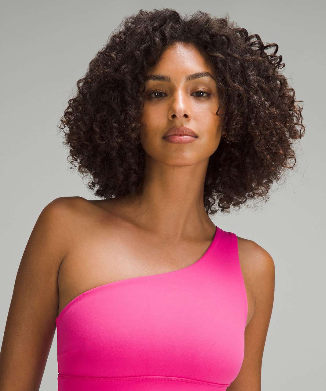 Asymmetrical align bra light support (flush pink, size 6) is one