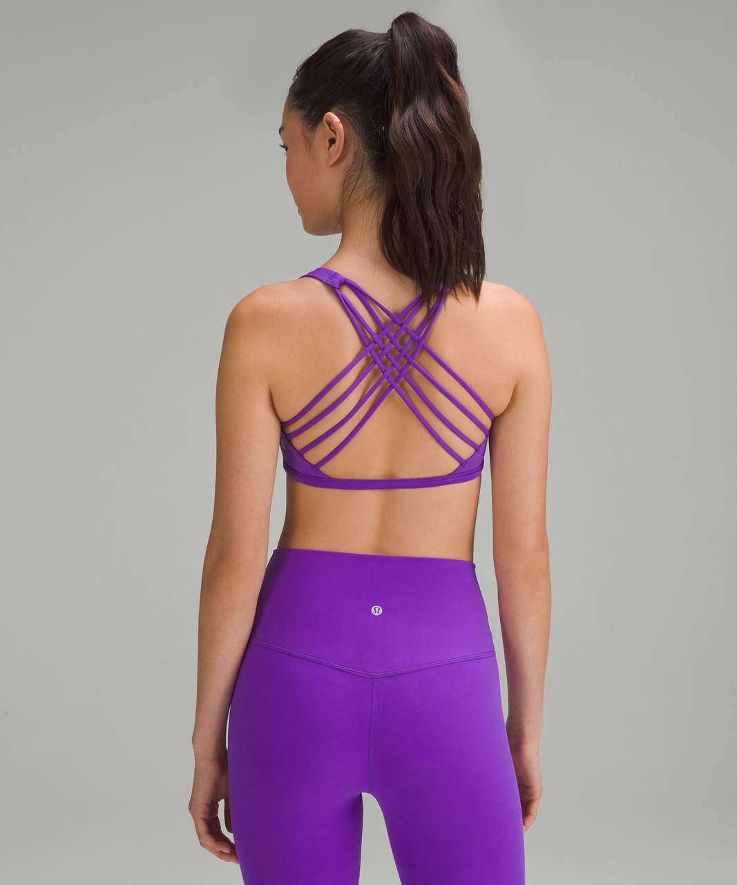 Women Lululemon lime green/ purple pattern sports bra Size 4