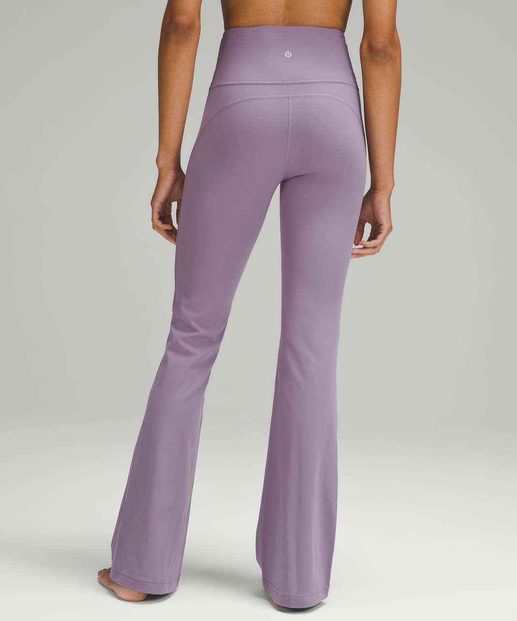 https://storage.googleapis.com/lulu-fanatics/product/87657/1280/lululemon-groove-super-high-rise-flared-pant-nulu-regular-purple-ash-055841-465407.jpg