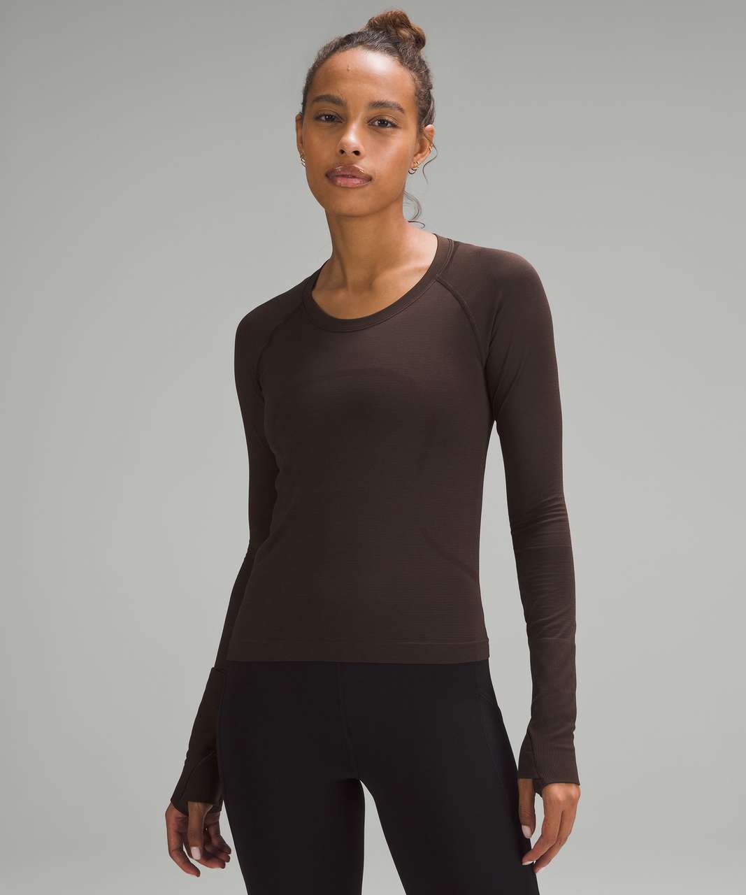 https://storage.googleapis.com/lulu-fanatics/product/88640/1280/lululemon-swiftly-tech-long-sleeve-shirt-2-0-race-length-espresso-espresso-063588-470803.jpg