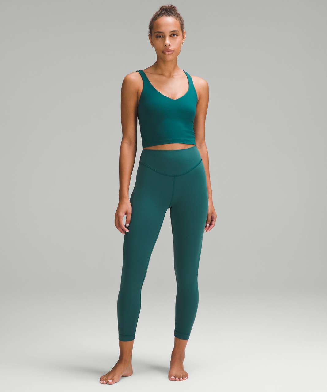 Lululemon In Movement HR Tight 25 - Nocturnal Teal size 4, Women's  Fashion, Activewear on Carousell