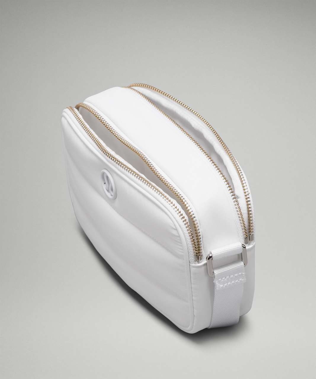 white camera bag crossbody