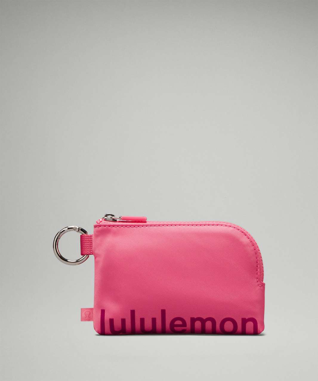 https://storage.googleapis.com/lulu-fanatics/product/90079/1280/lululemon-clippable-card-pouch-sakura-pink-washed-mauve-064766-478468.jpg