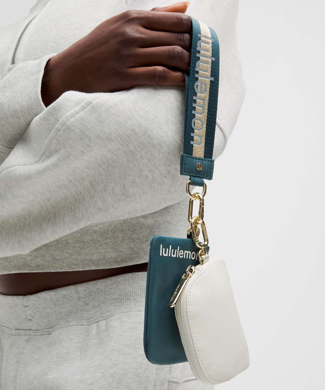 Lululemon Dual Pouch Wristlet *Wordmark - Warp Teal / Gold Lululemon Dual Pouch Wristlet *Wordmark - Warp Teal / Gold