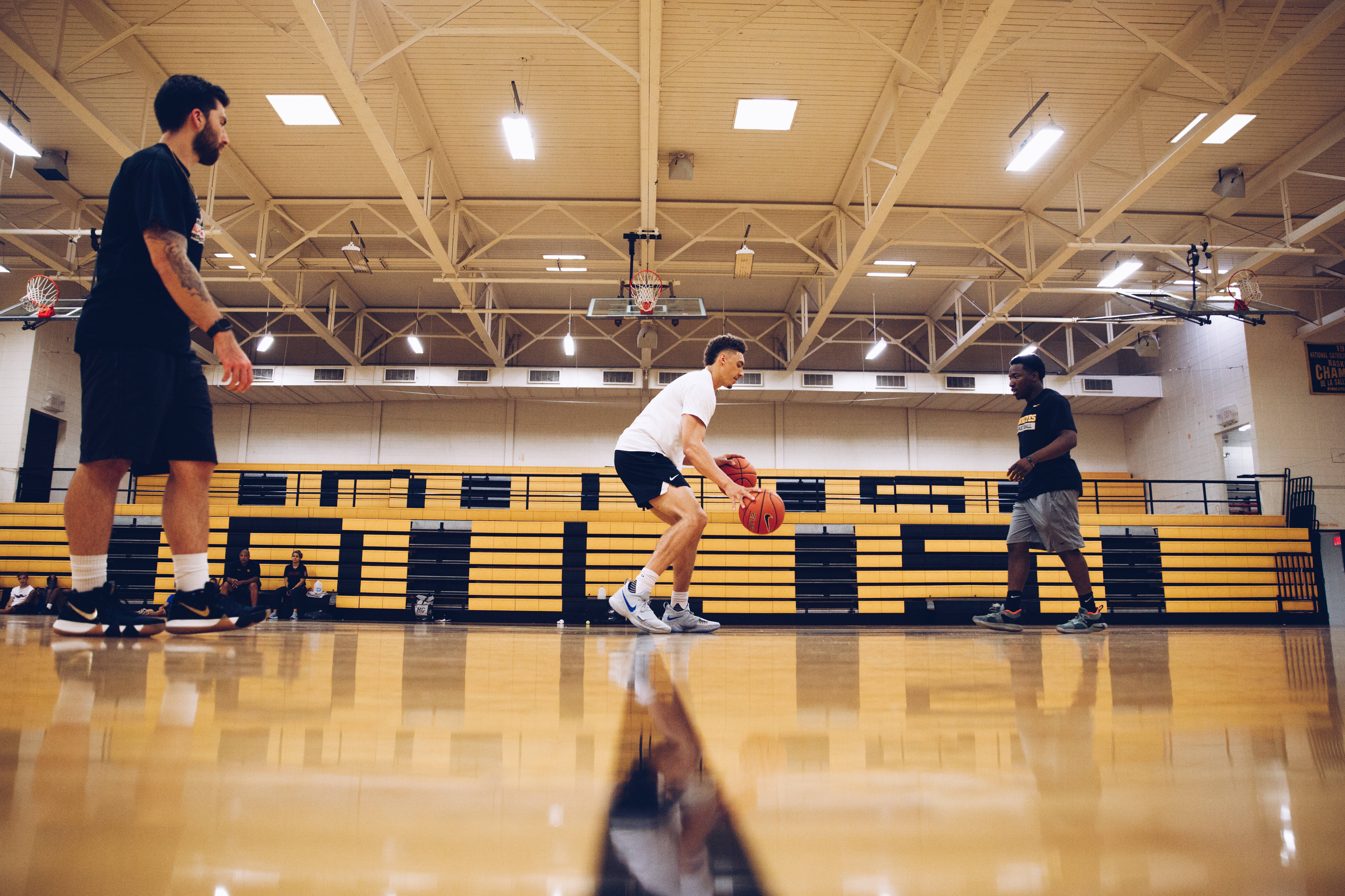 youth basketball performing ball handling drills