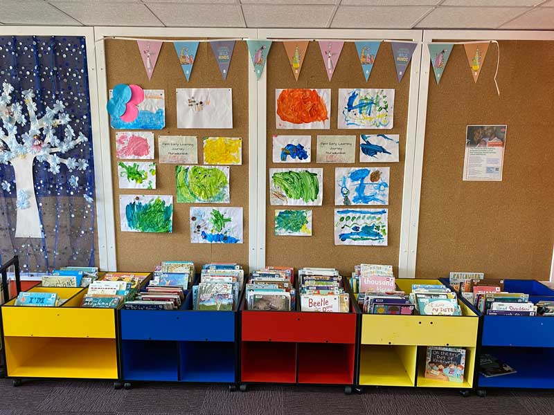 Library displays children's learning building community connections for families.