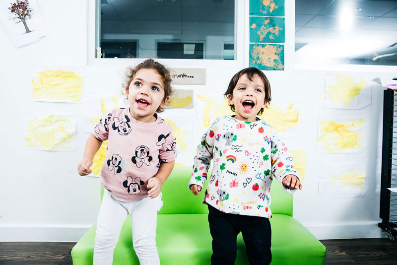 Children engage in dramatic play with an impromptu drama performance.