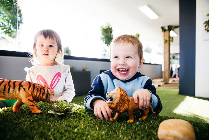 Children playing at daycare while mum and dad re-enter the workforce.