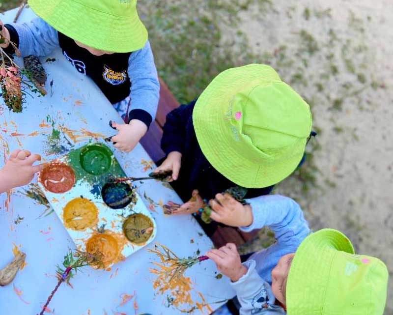 Children invited to participate in play and learning with intentional teaching.