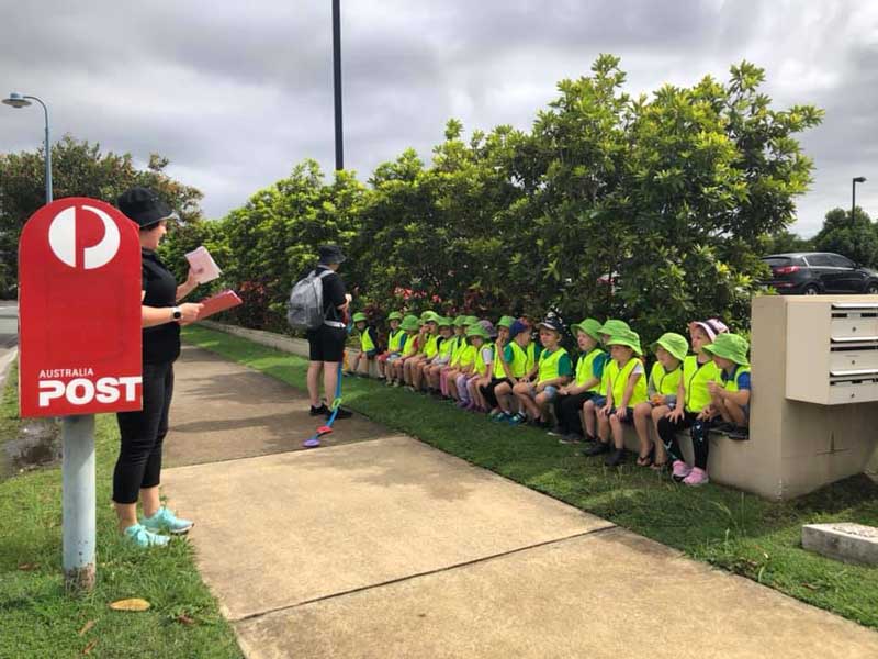 Children post mail to oversees troops - a community event for Anzac Day.