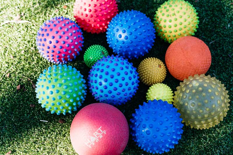 Different balls can lead to multiple fun physical activities for toddlers.