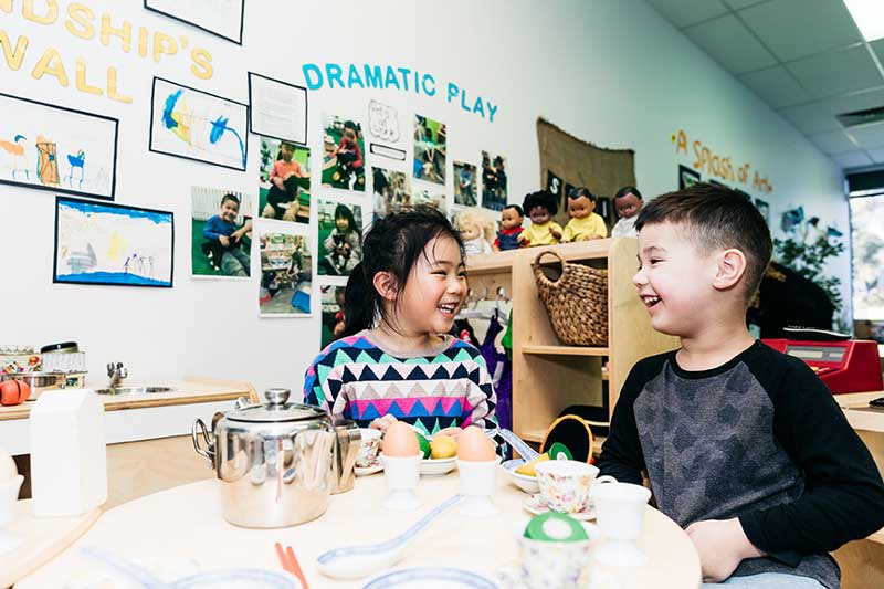 Diversity and inclusion activities include children roleplaying with assorted multicultural kitchenware.