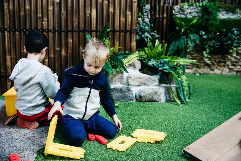 Children play Simon Says to encourage kids cleaning.