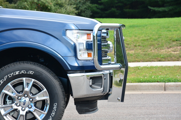 Blue Ford F150 with chrome grille guard by LUVERNE