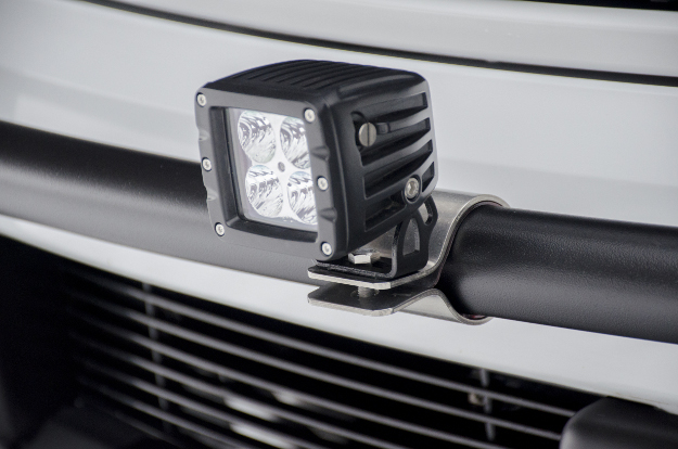 LED work light with 2 inch tabs on LUVERNE grille guard