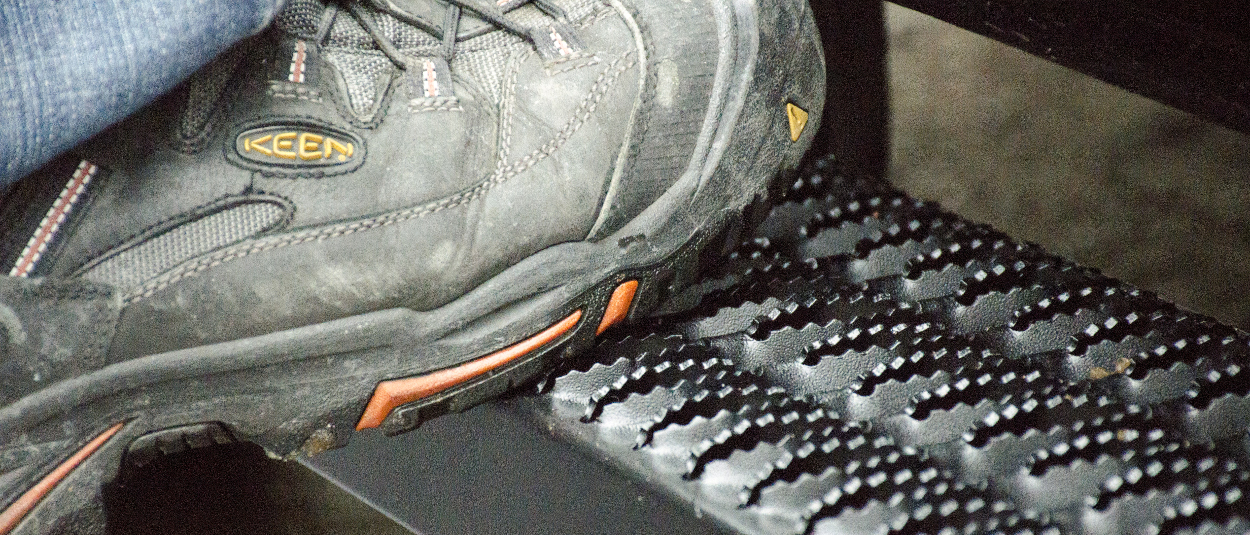 Grip Step™ expanded aluminum treads lock onto work boots