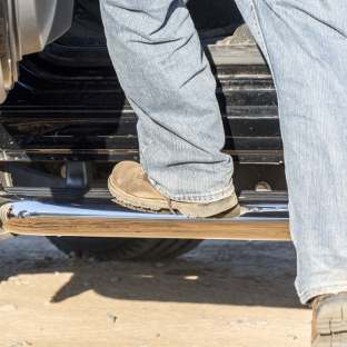 LUVERNE MegaStep® running boards on work truck - worker boots