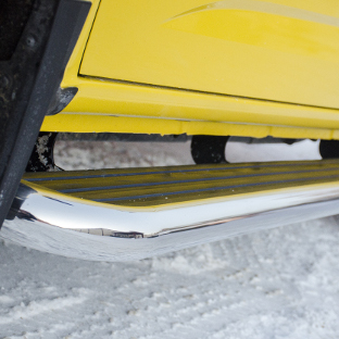 LUVERNE MegaStep® running boards on yellow truck