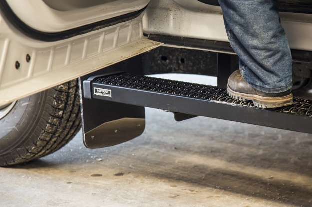 White Ford truck with Mud Guards and Grip Step™ running boards