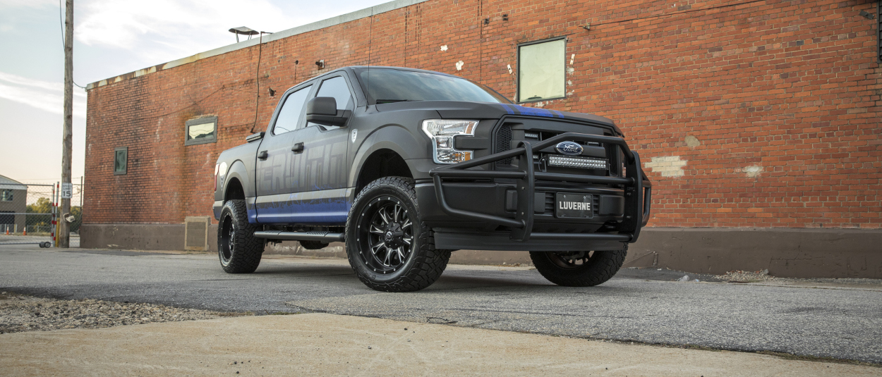 Custom Ford F150 police truck with Baja Guard™ and O-Mega II™ steps from LUVERNE