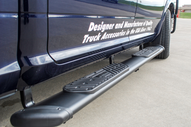 LUVERNE black Regal 7™ truck side steps on blue truck