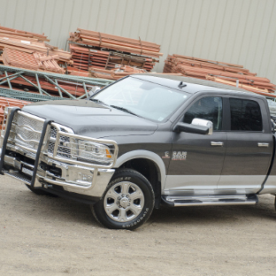 Grey Ram 3500 work truck with LUVERNE Side Entry Steps and brush guard