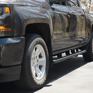 Black Chevrolet Silverado 1500 with SlimGrip™ running boards