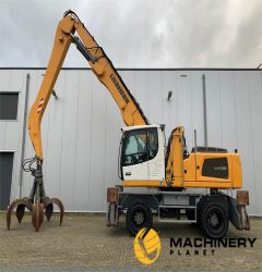 Liebherr LH 35 M + Liebherr Grapple. 
 2015 - # 5774