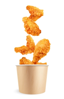 Chicken fast food realistic composition with isolated view of fried chicken wings falling into paper bucket vector illustration