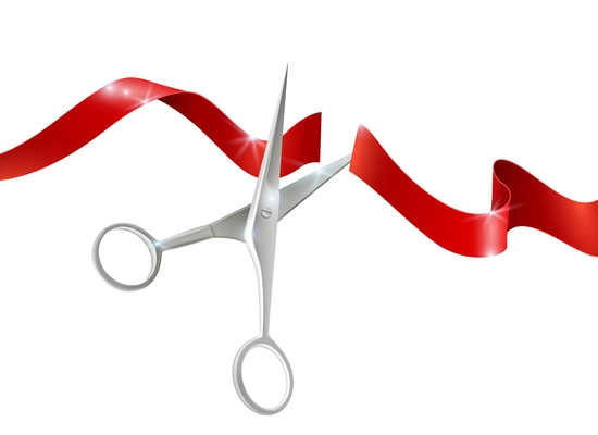 Metal scissors for cutting and red silk  ribbon realistic vector illustration