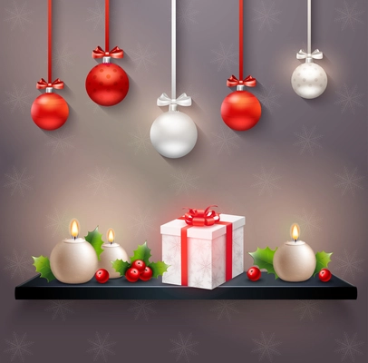 New year festive composition with hanging christmas balls gift box holly berries and round candles realistic vector Illustration