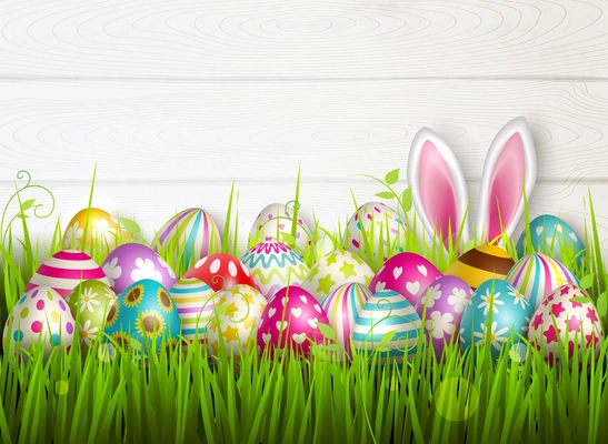 Easter composition with colourful images of festive easter eggs on green grass surface with bunny ears vector illustration