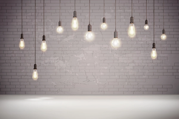 Realistic vintage light bulbs on background with grey brick wall vector illustration