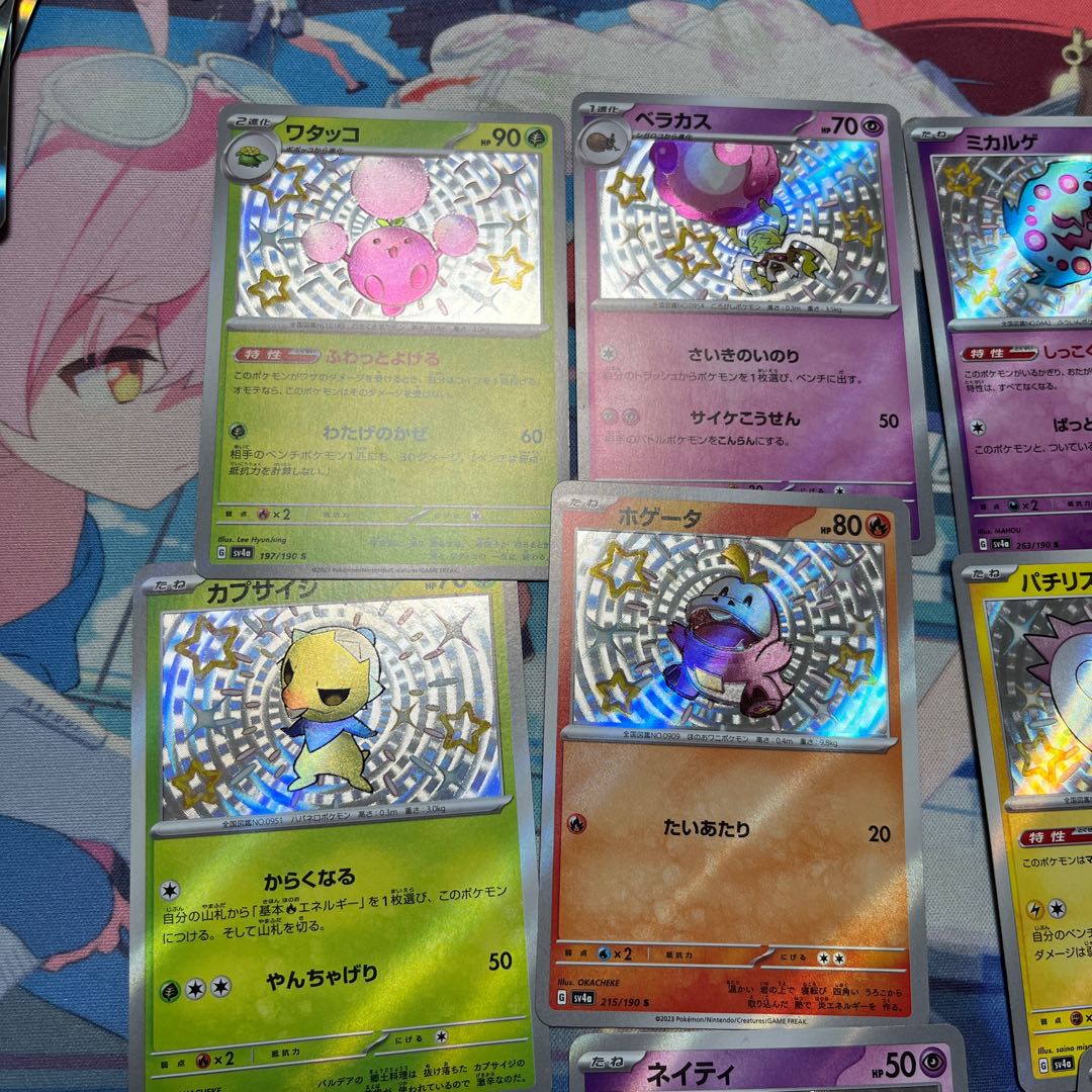 Pokémon cards, 10 sets of different colors.