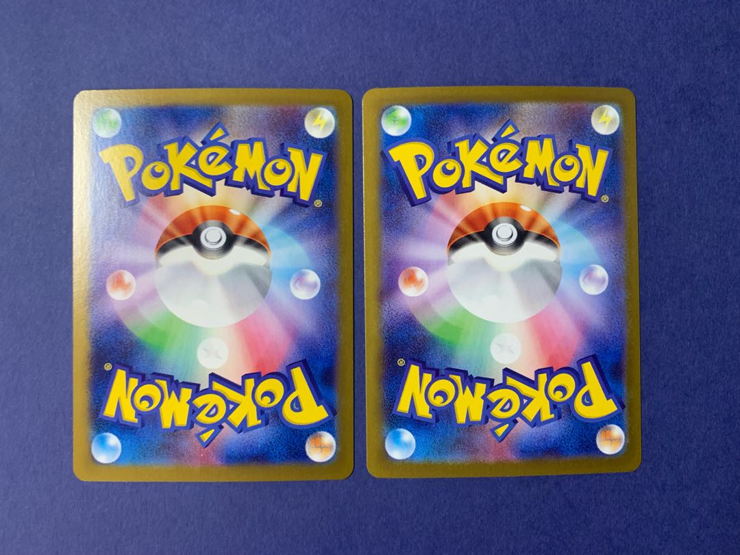 four flat objects (e.g. tickets, pieces of cloth, etc.) Pikachuex RR 033/106