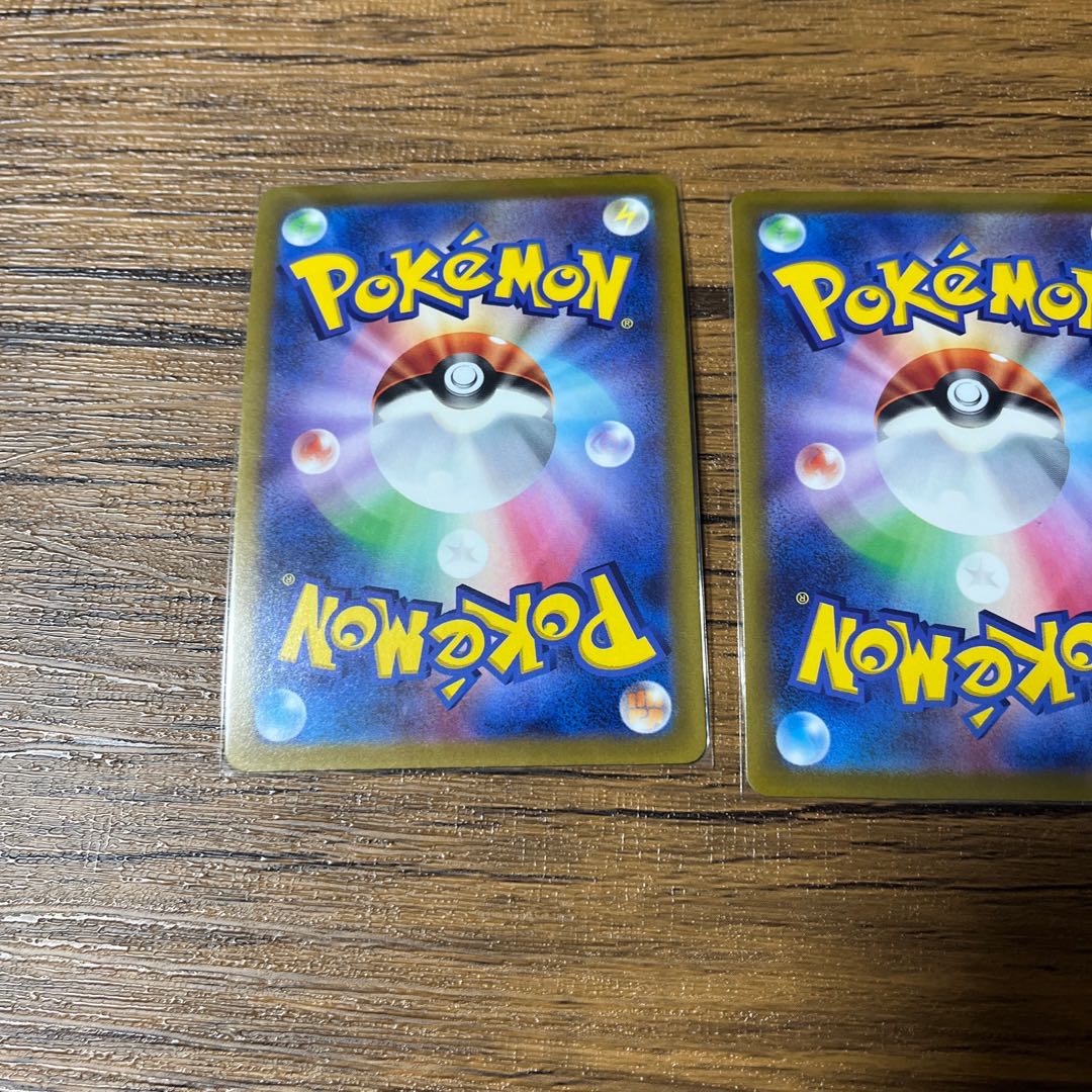 three flat objects (e.g. tickets, pieces of cloth, etc.) Kagayaku Hawlucha K 078/172