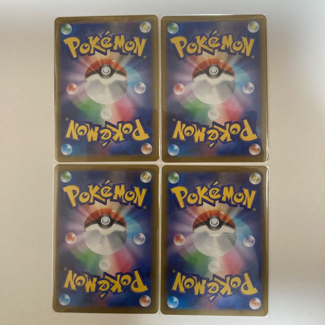 four flat objects (e.g. tickets, pieces of cloth, etc.) Moltres U 014/080